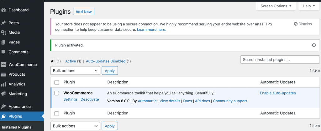 WordPress plugins page with WooCommerce activated.
