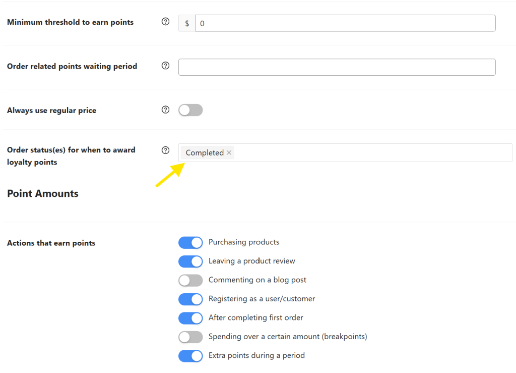 Admin interface showing the dropdown menu for selecting order statuses like "Completed" for awarding loyalty points