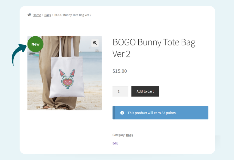WooCommerce product page showing a product label and loyalty points earned message for a tote bag